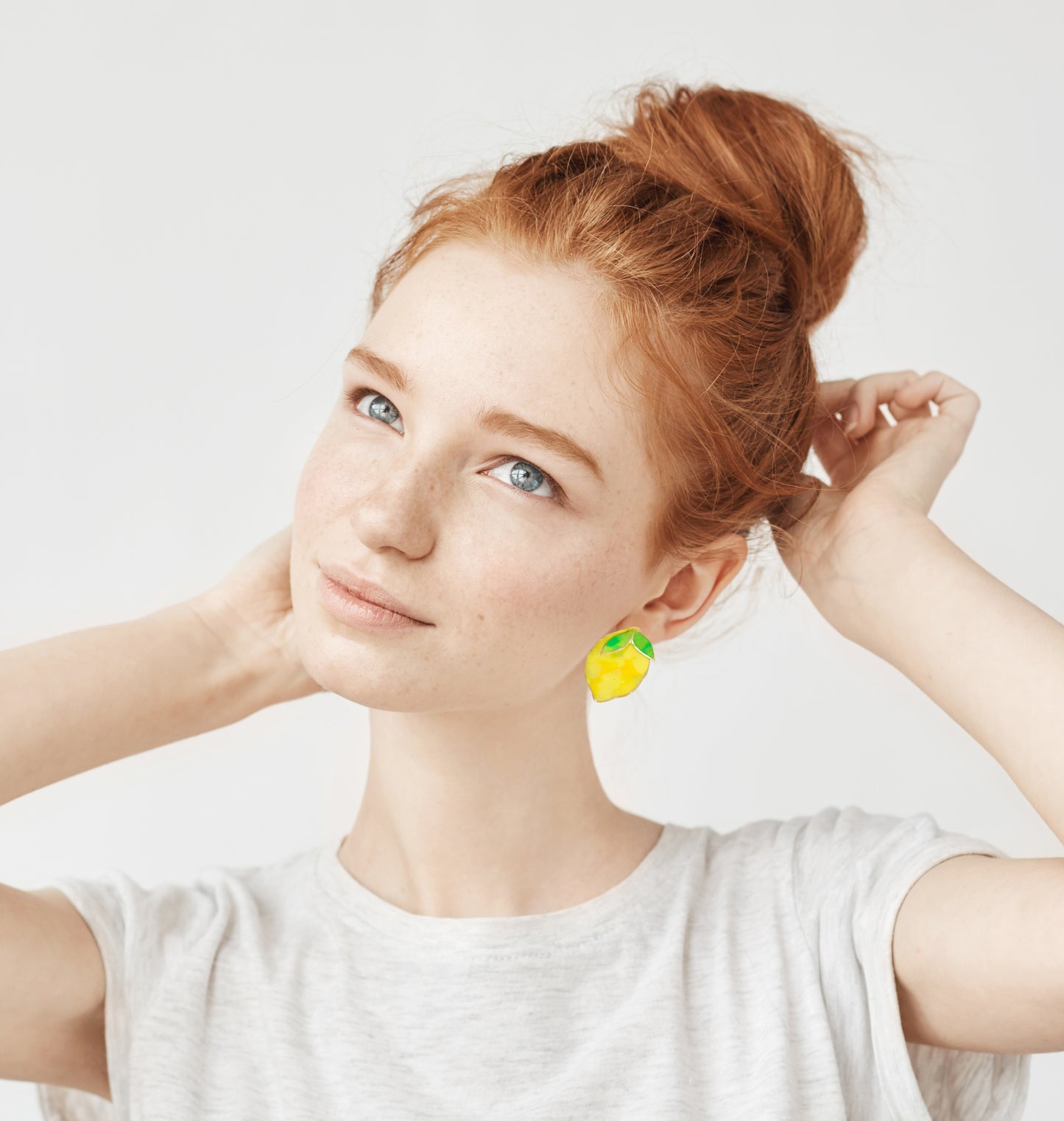 „Citrus“-Ohrringe aus gelbem recyceltem Kunststoff